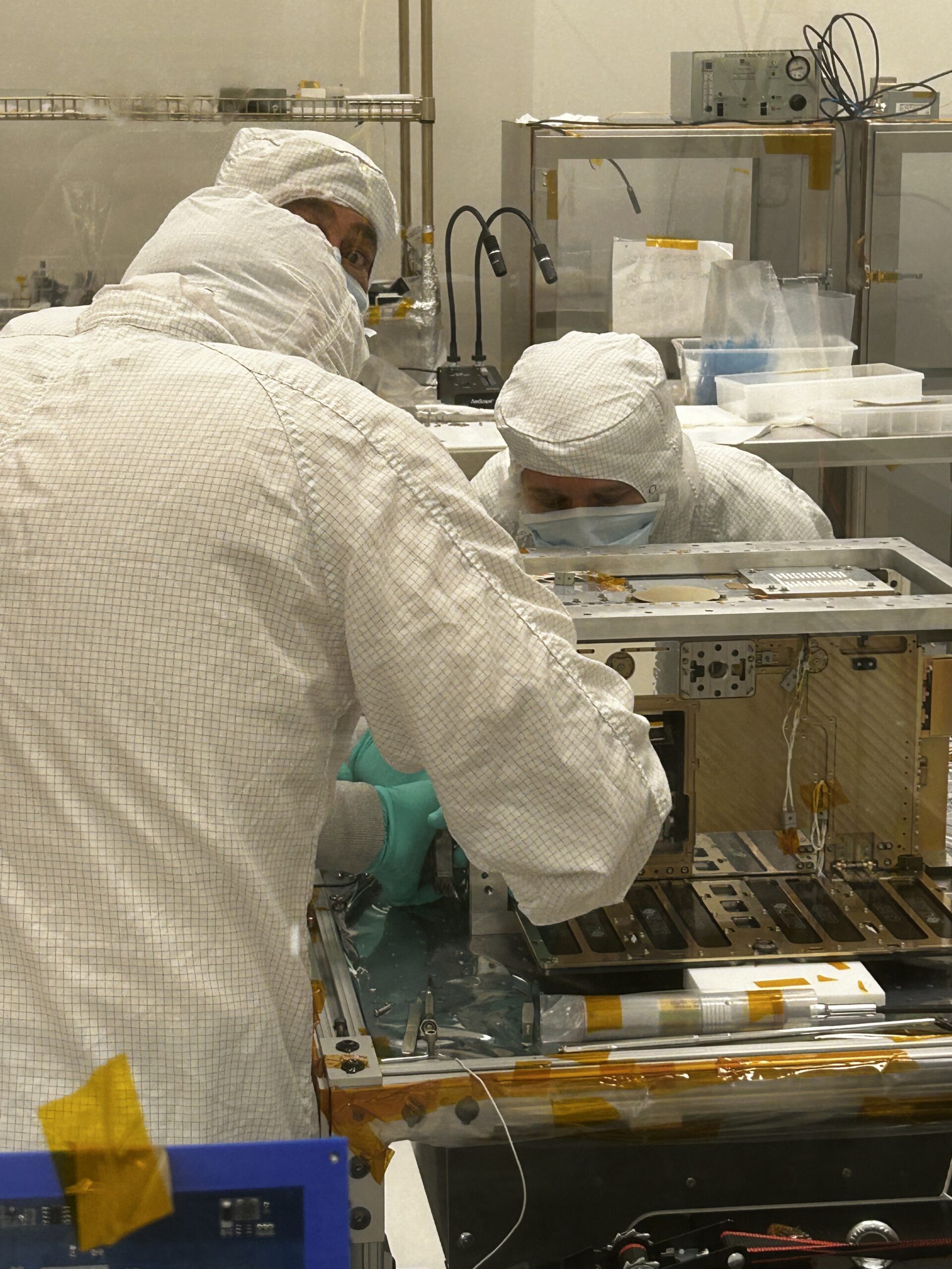 Dmitry, Briana, and Alex Sico working on SPRITE in the cleanroom.
